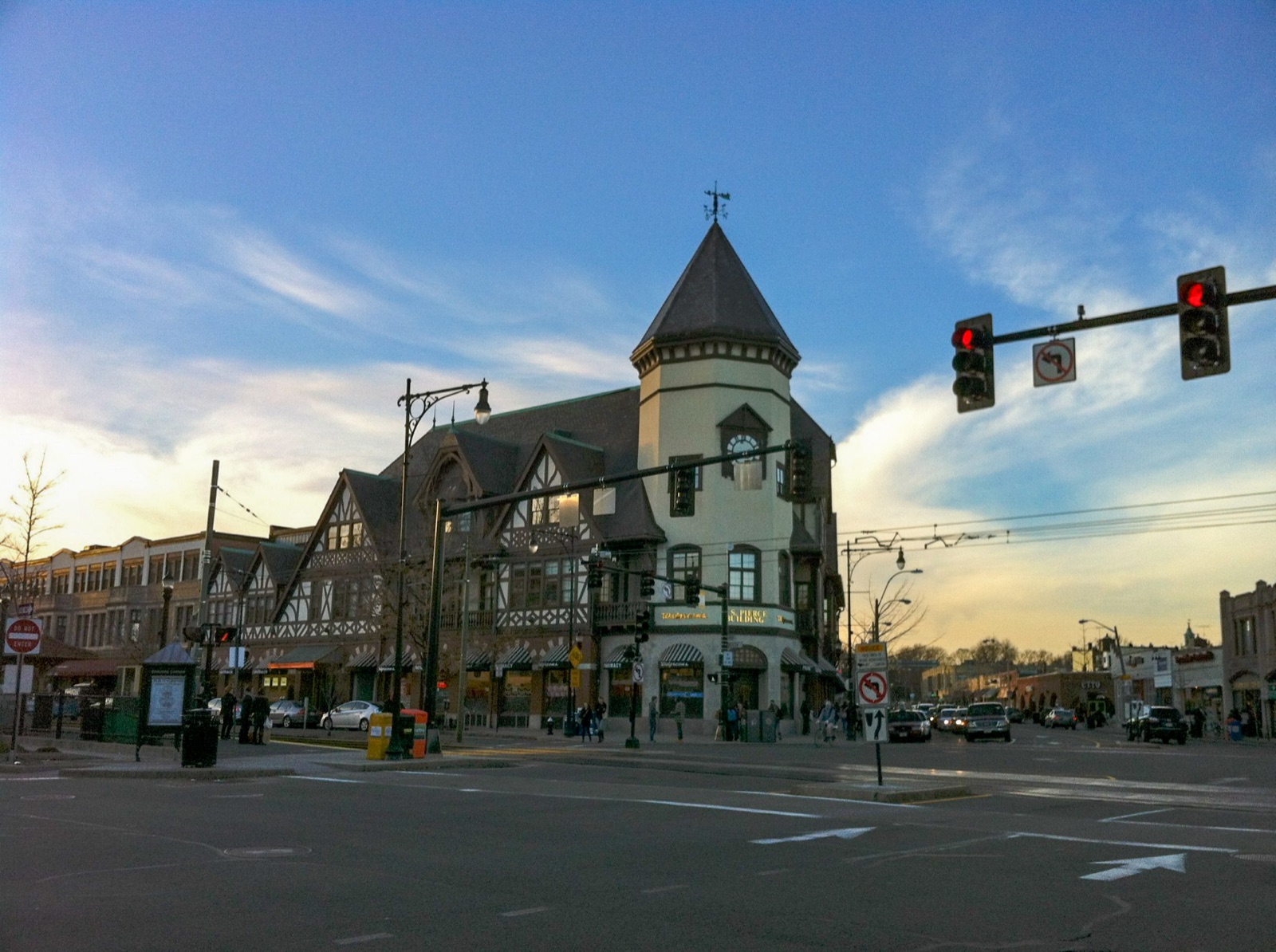 Coolidge Corner intersection of Harvard and Beacon Streets in Brookline Massachusetts with the historic SS Pierce Building clock tower at center near NETA