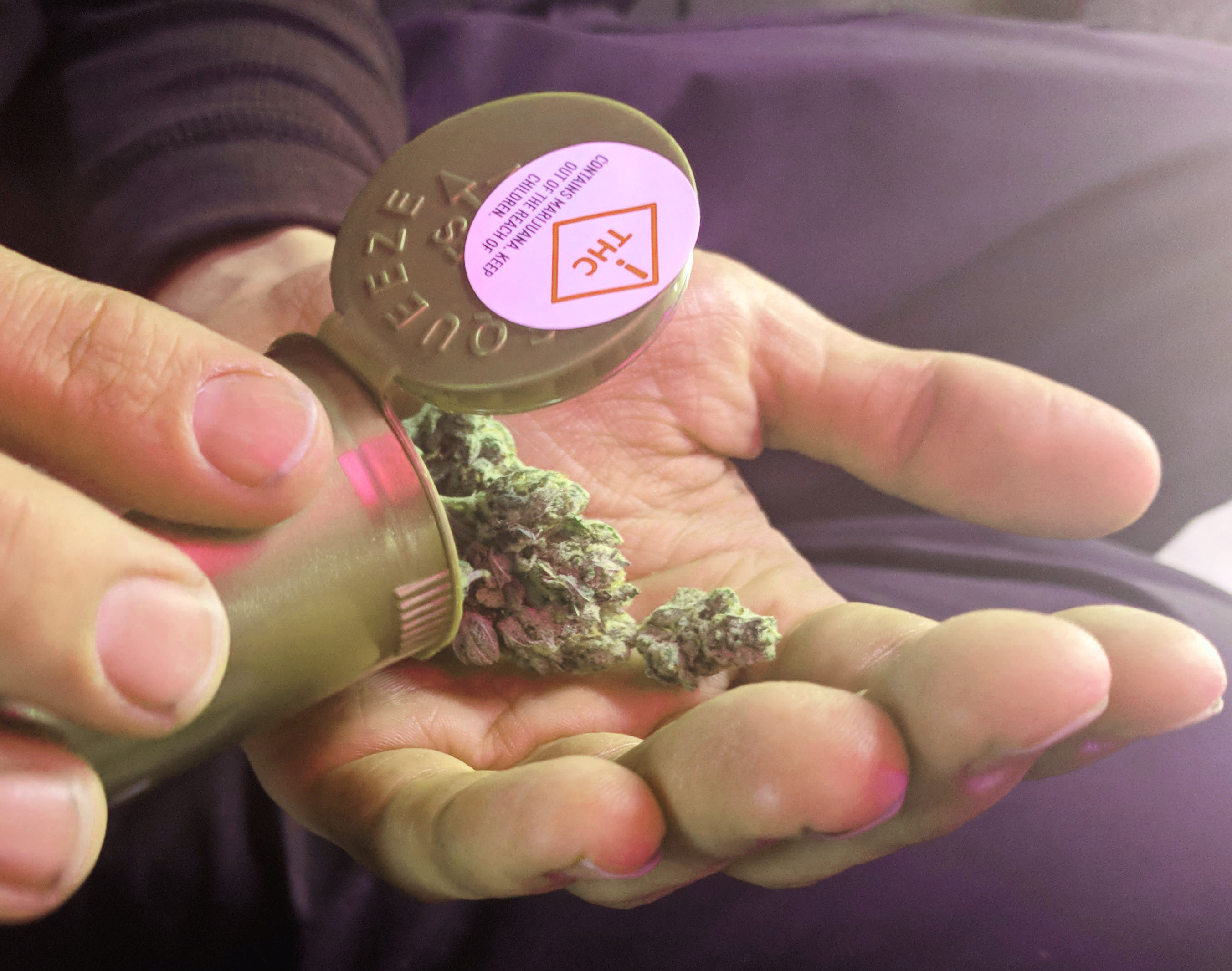 Legal cannabis marijuana products including flower jars and packaging in Denver Colorado