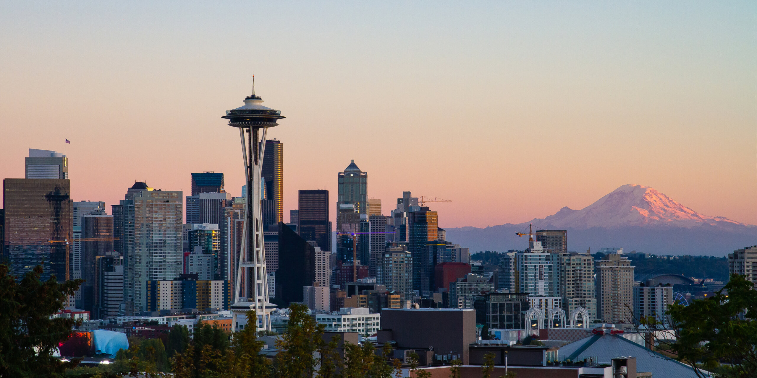 Seattle skyline at dusk viewed from Kerry Park with Space Needle and downtown high-rises