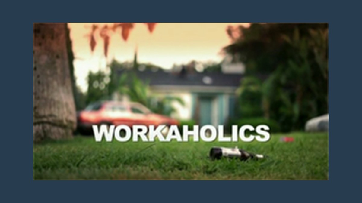 Workaholics Comedy Central title card showing the suburban tract house