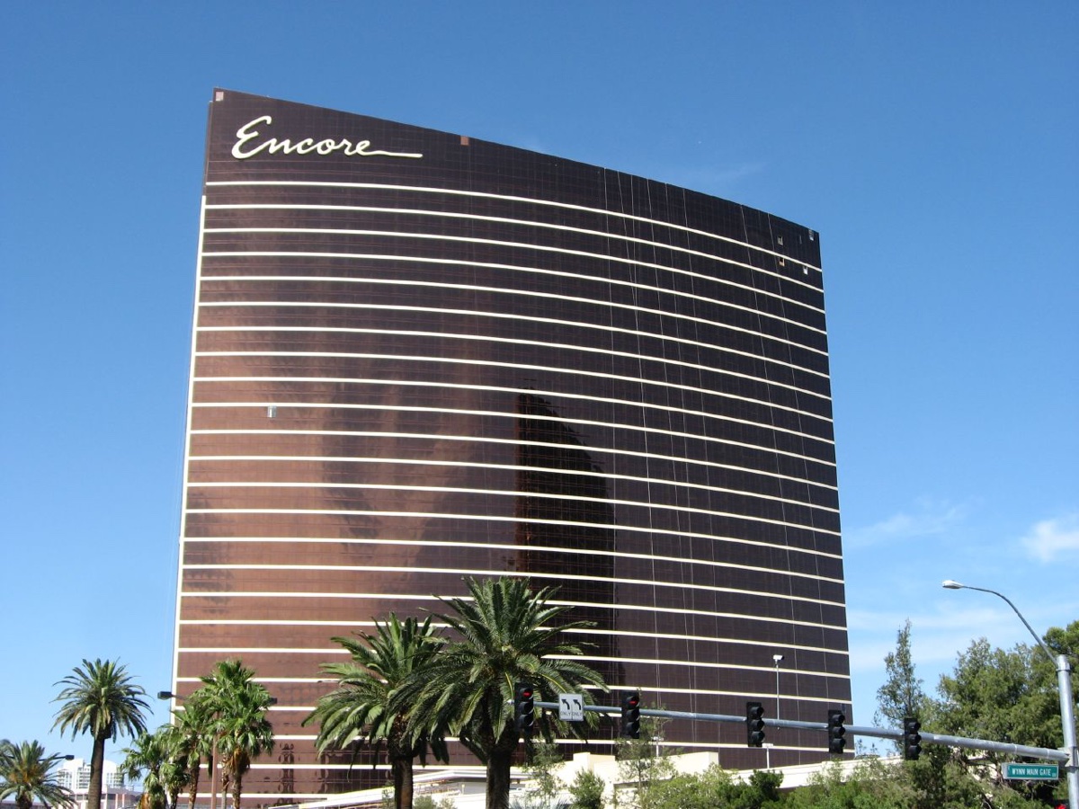 The Wynn and Encore towers on the north Las Vegas Strip, the hotel cluster six minutes on foot from Thrive Cannabis Marketplace's Strip-adjacent storefront on Sammy Davis Jr Drive.