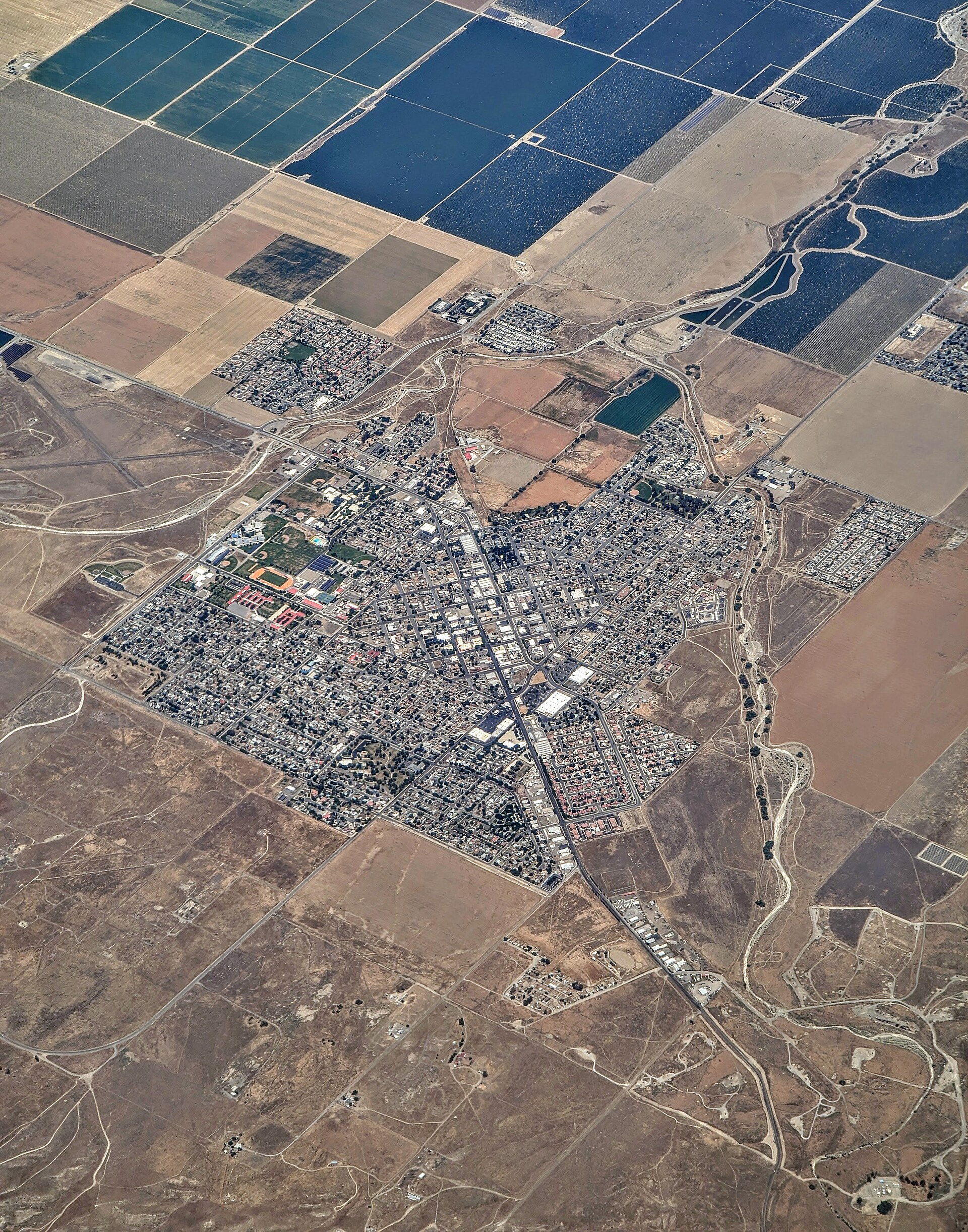 Aerial view of Coalinga, California, the Fresno County town where Mike Tyson opened the 420-acre Tyson Ranch cannabis cultivation property in 2018