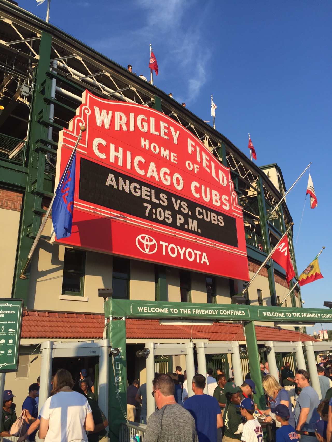 Wrigley Field red art deco marquee with Cubs game time, Sunnyside Wrigleyville dispensary is steps from this entrance