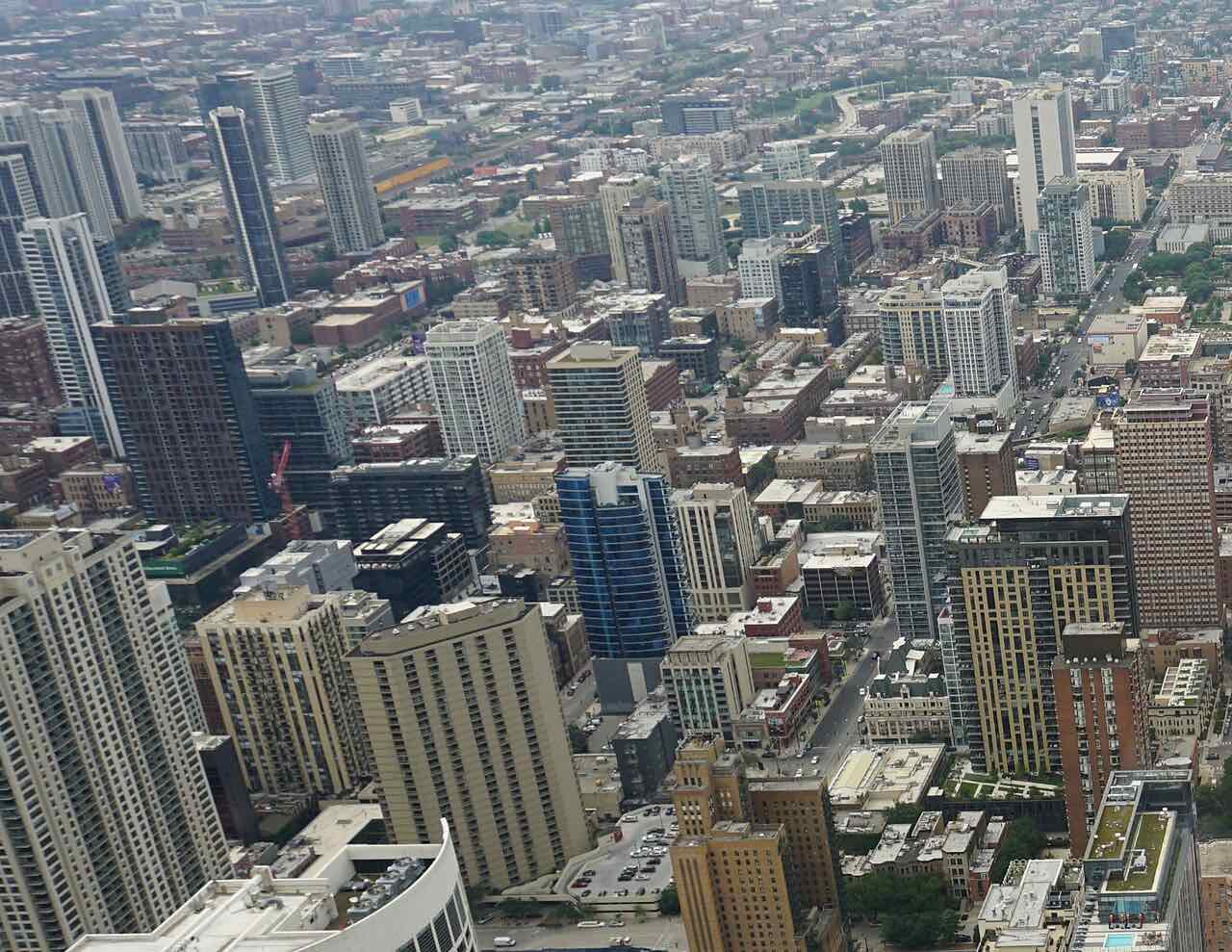 Aerial view of the dense River North and Near North Side high-rise district in Chicago, the downtown grid of residential towers and hotels where Ascend River North dispensary operates